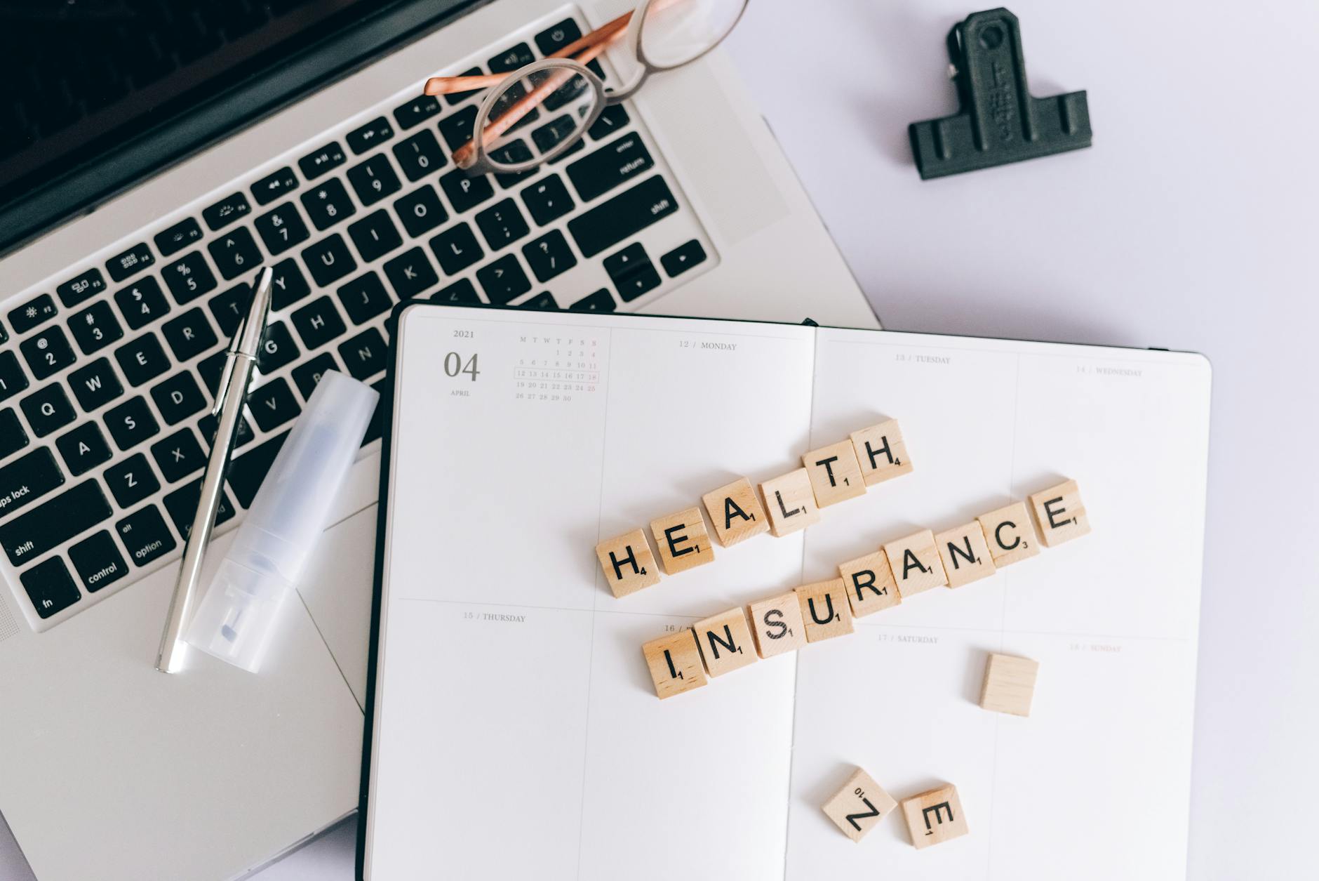 A clean editorial insurance planning scene with policy and protection visuals